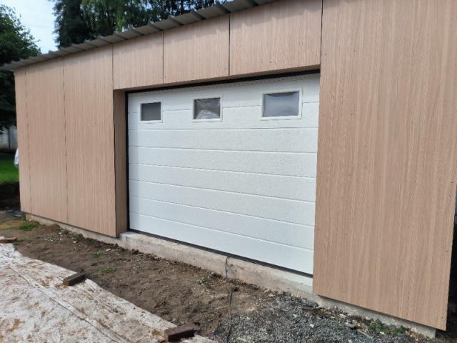 FABRICATION ET POSE D'UN GARAGE EN RESINE AVEC POSE D'UNE PORTE SECTIONNELLE